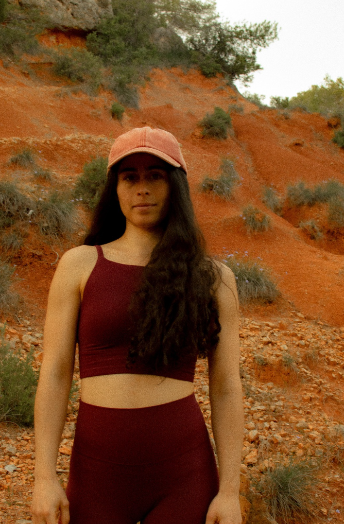 Sarah, founder of Ocre Flow, in the ochre hills of Provence